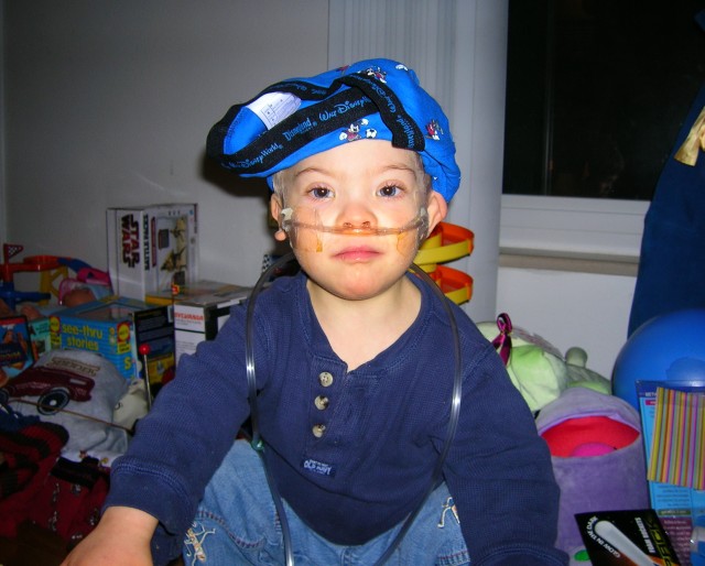 Silly Raphael with oxygen cannula and his brother's underwear on his head.